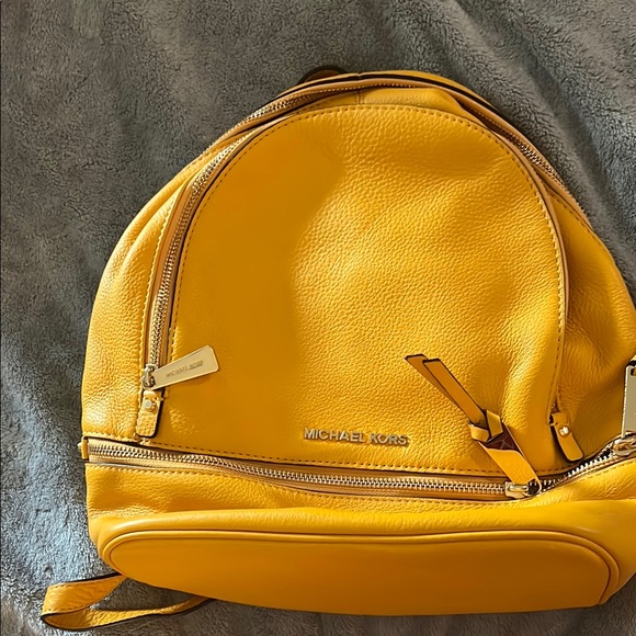 Michael Kors Yellow Backpack with Gold Zippers and Smooth Material - Picture 1 of 4